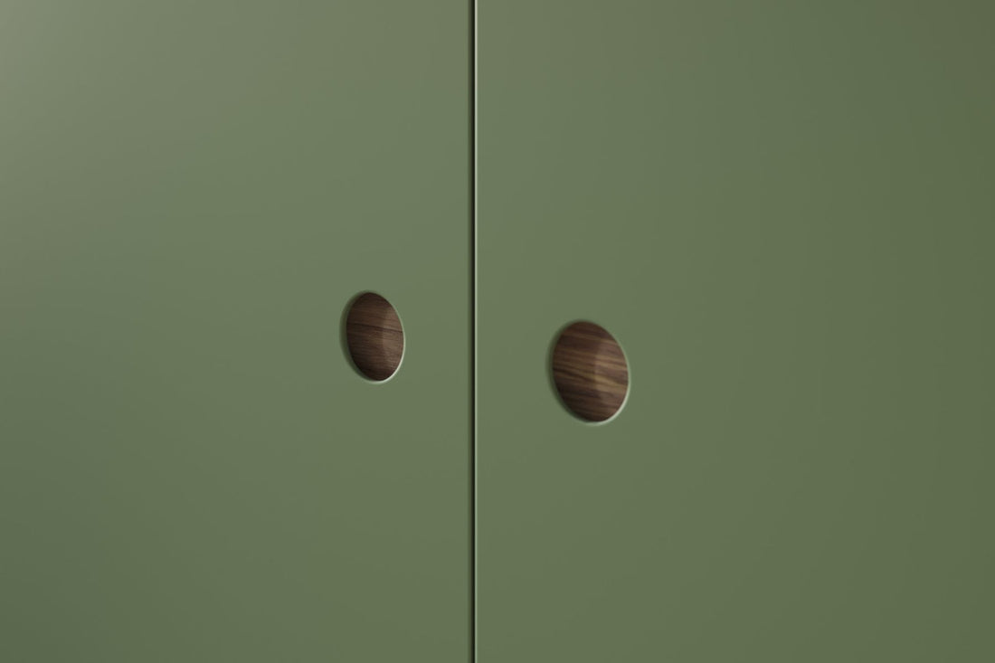 Green painted slab doors with round integrated handles
