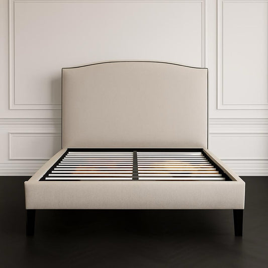 Elegant Upholstered Bed with Curved Headboard and Sturdy Frame