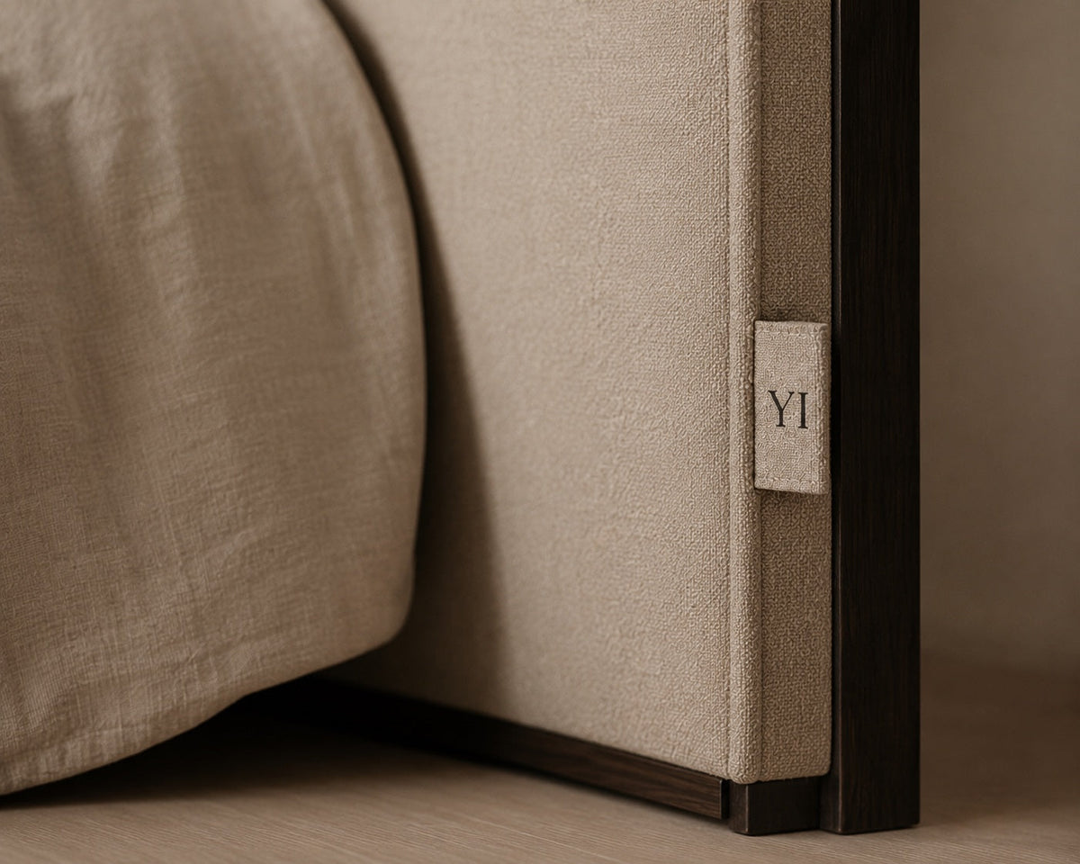 Oak frame and linen upholstery on a Yorkshire Interiors headboard, with the YI label
