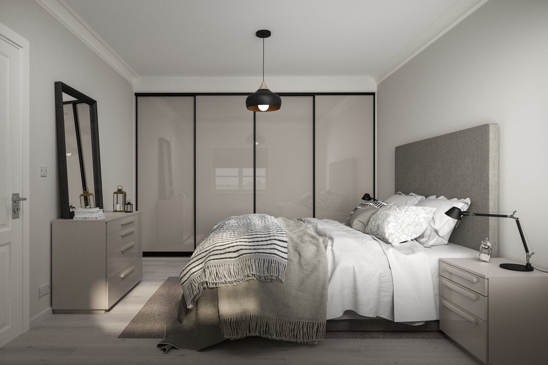 Sliding wardrobe with grey glass doors in a black gloss frame